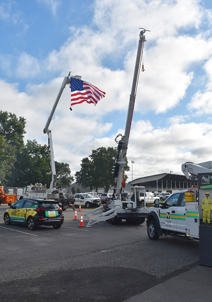 co-op truck raising USA flag