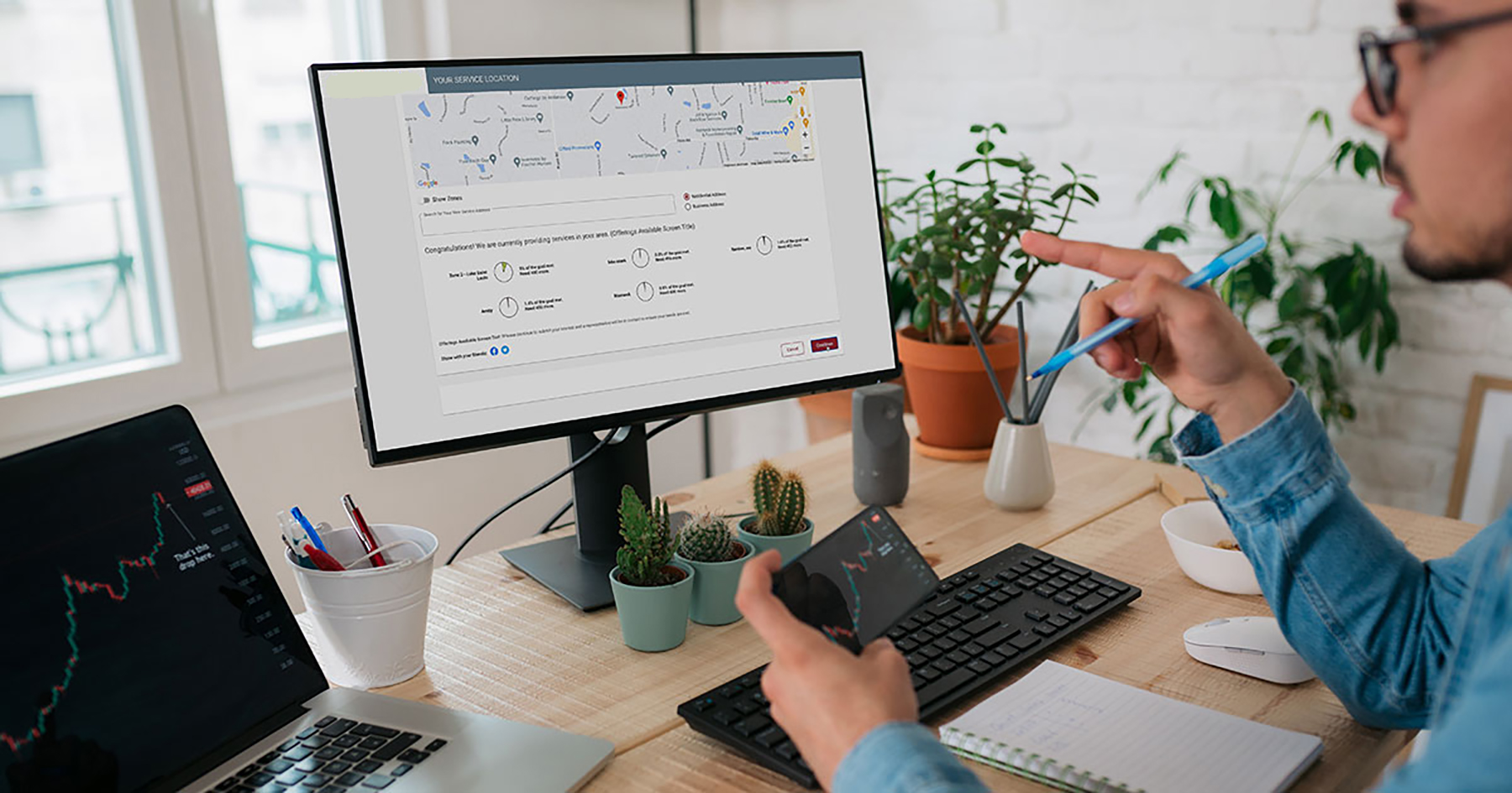Man updating information on desktop pc